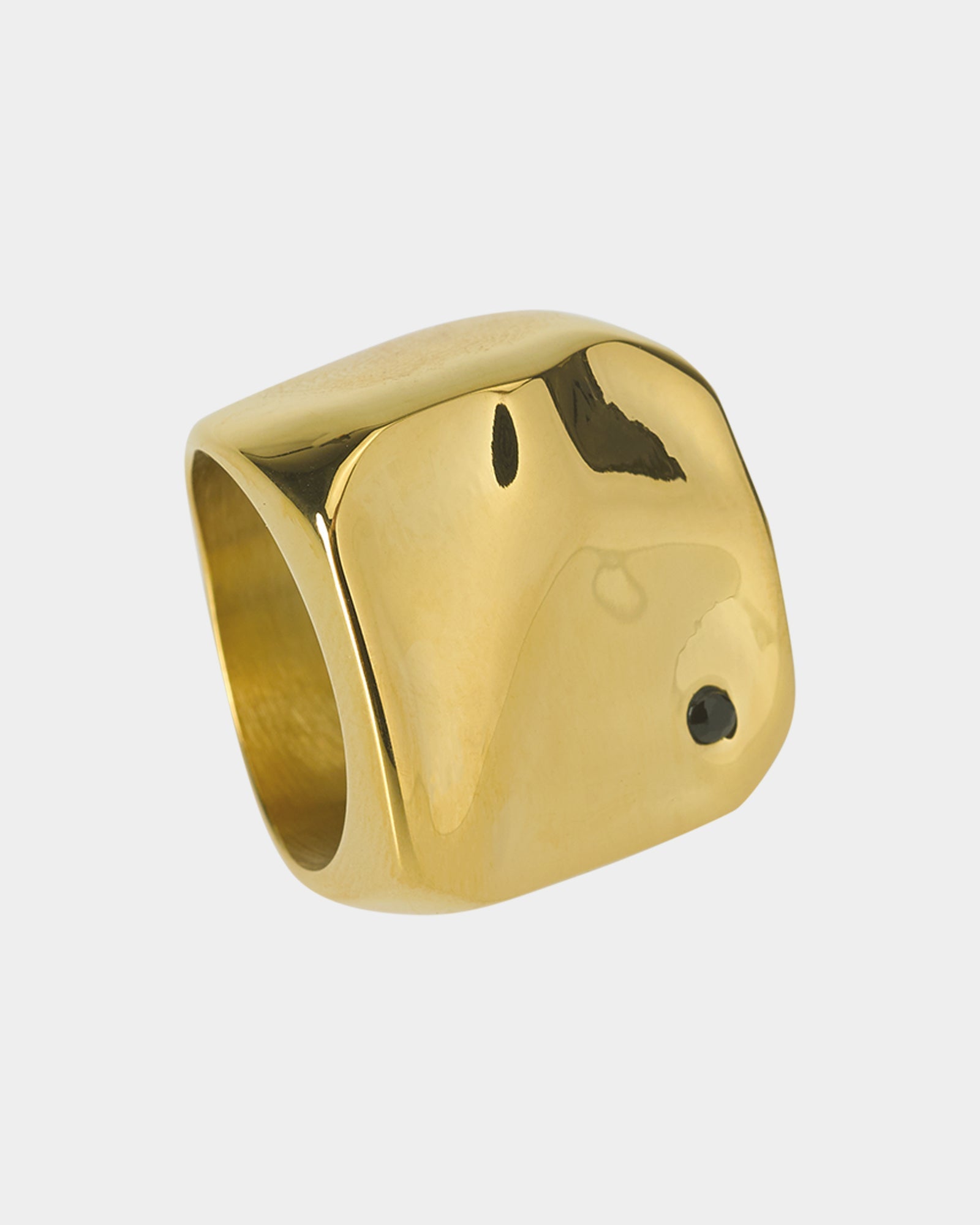 Golden chunky ring in stainless steel on a white background