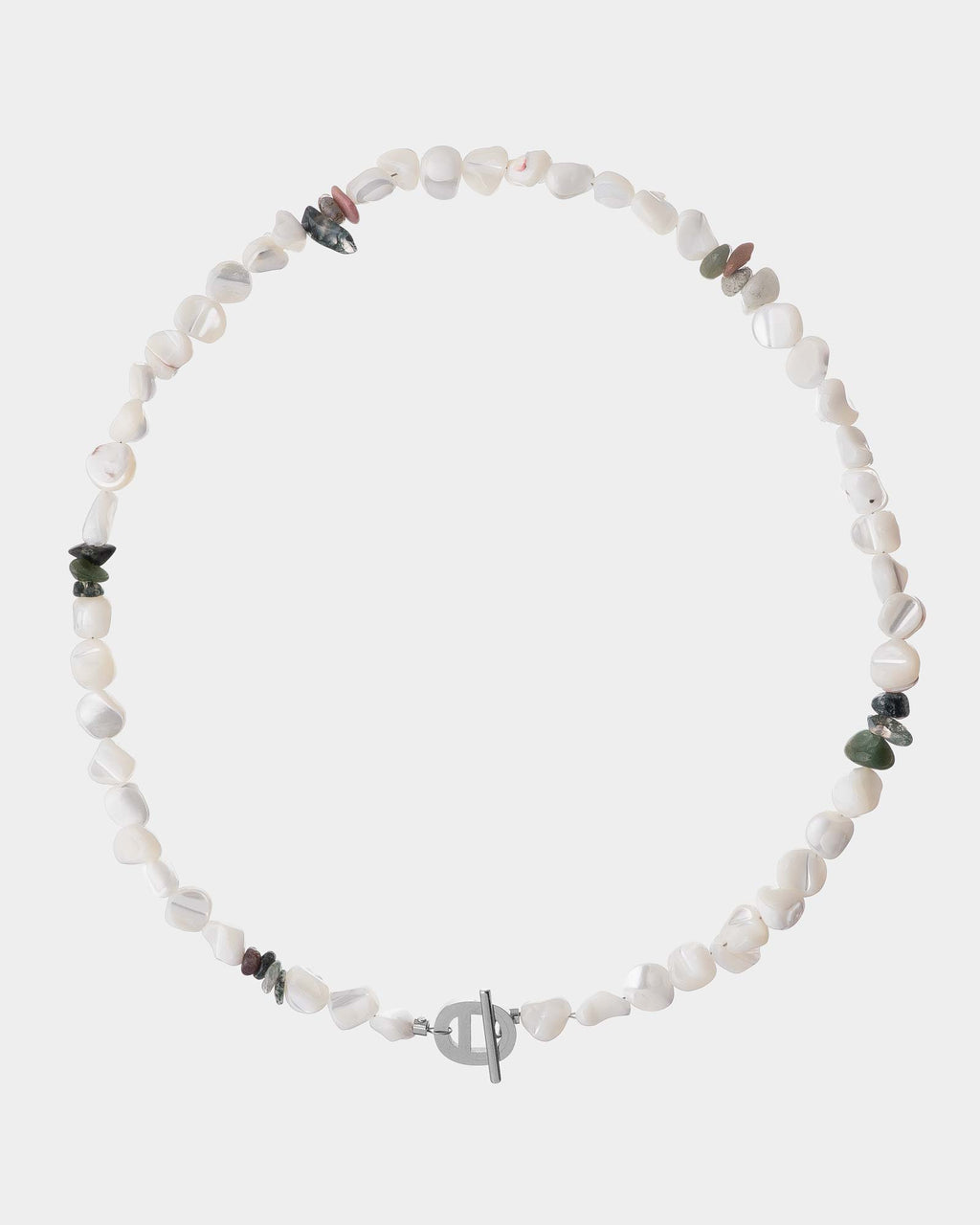 Necklace with white beads and small colored stones on a white background
