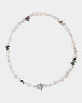 Necklace with white beads and small colored stones on a white background
