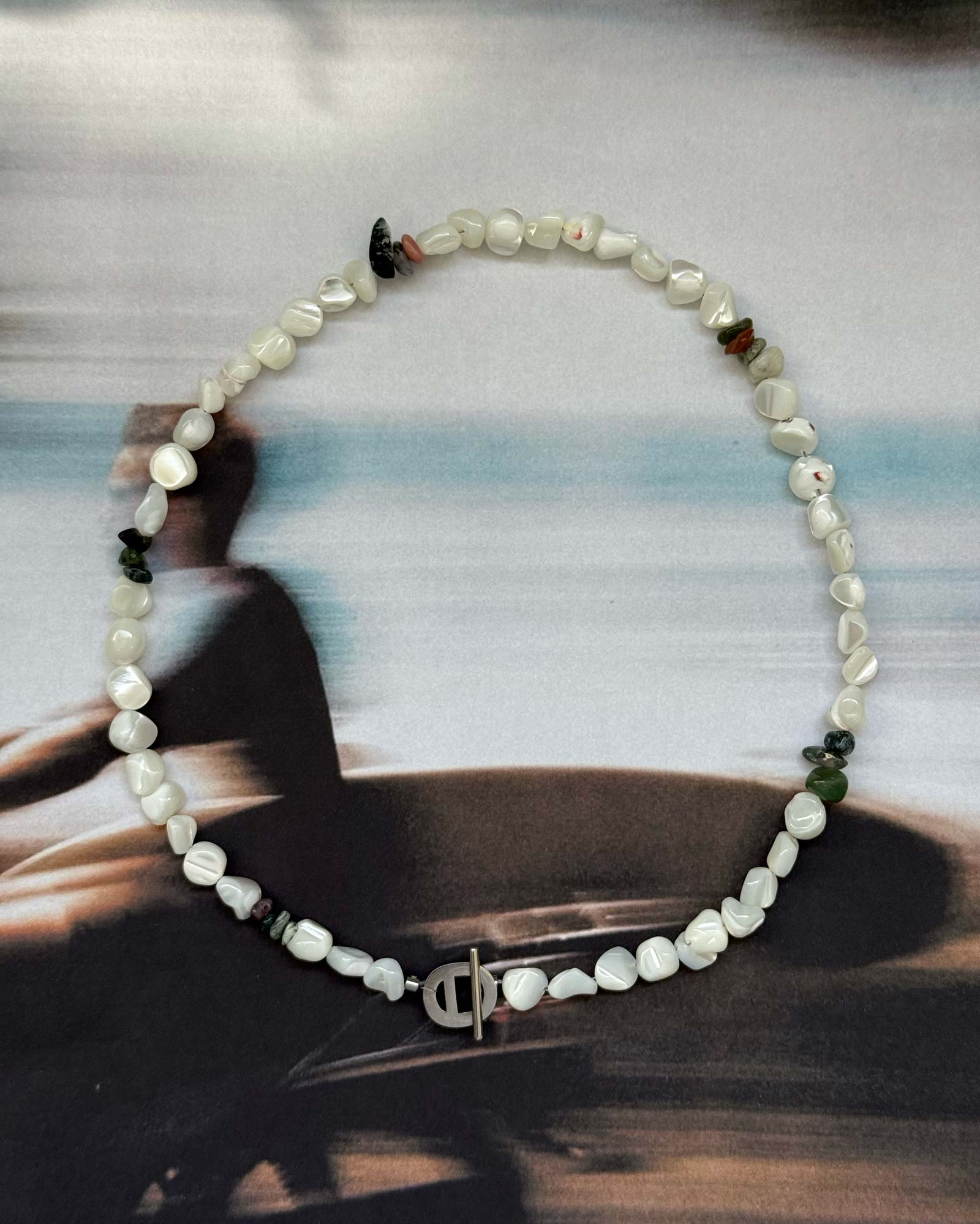 Alouette stone necklace with a blurred background
