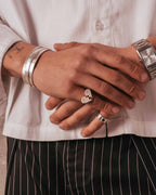 Soulmates ring in 925 silver worn by model on a neutral background