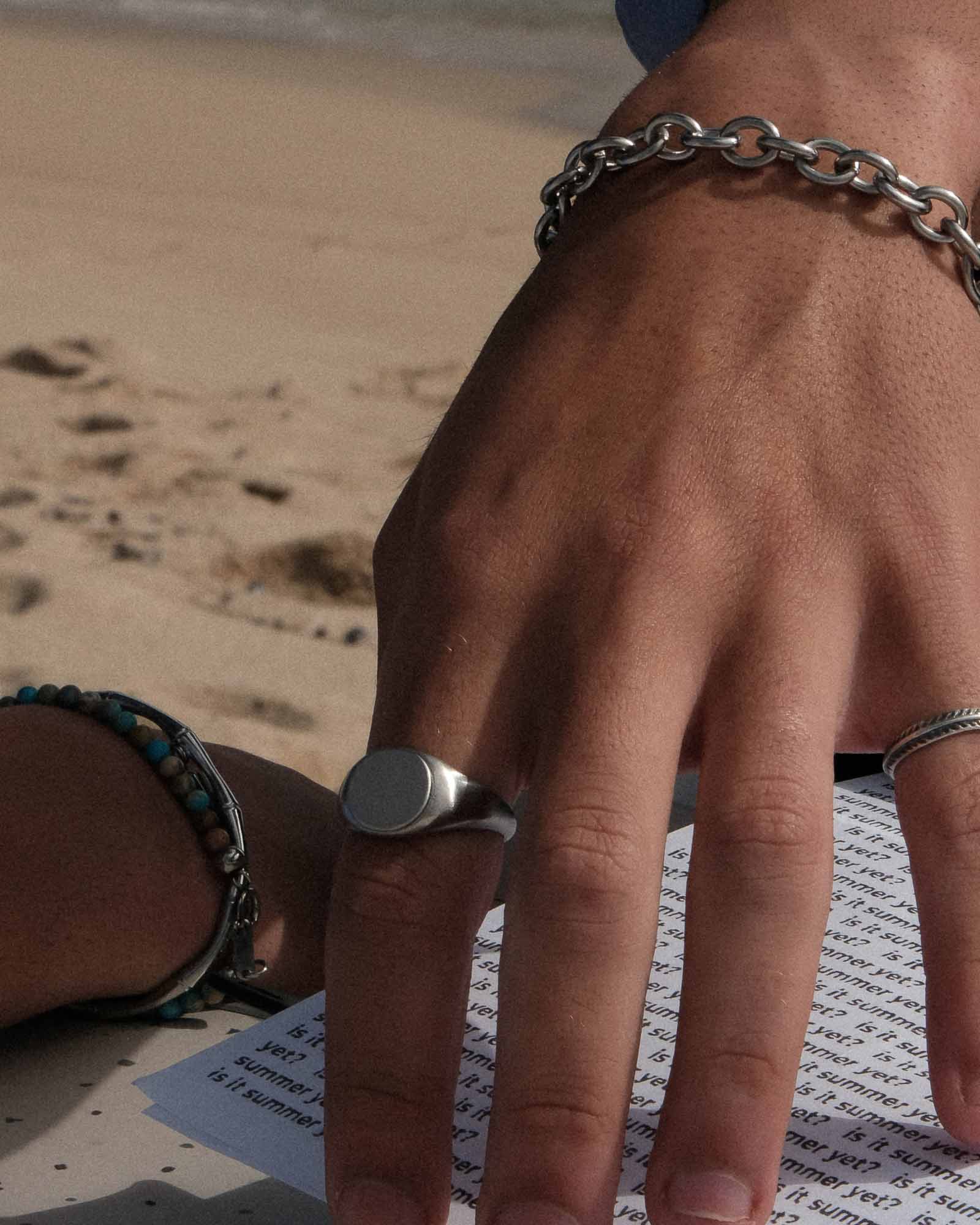 creta stainless steel ring on the model's hand