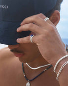 Lapis lazuli ring placed on the model's little finger