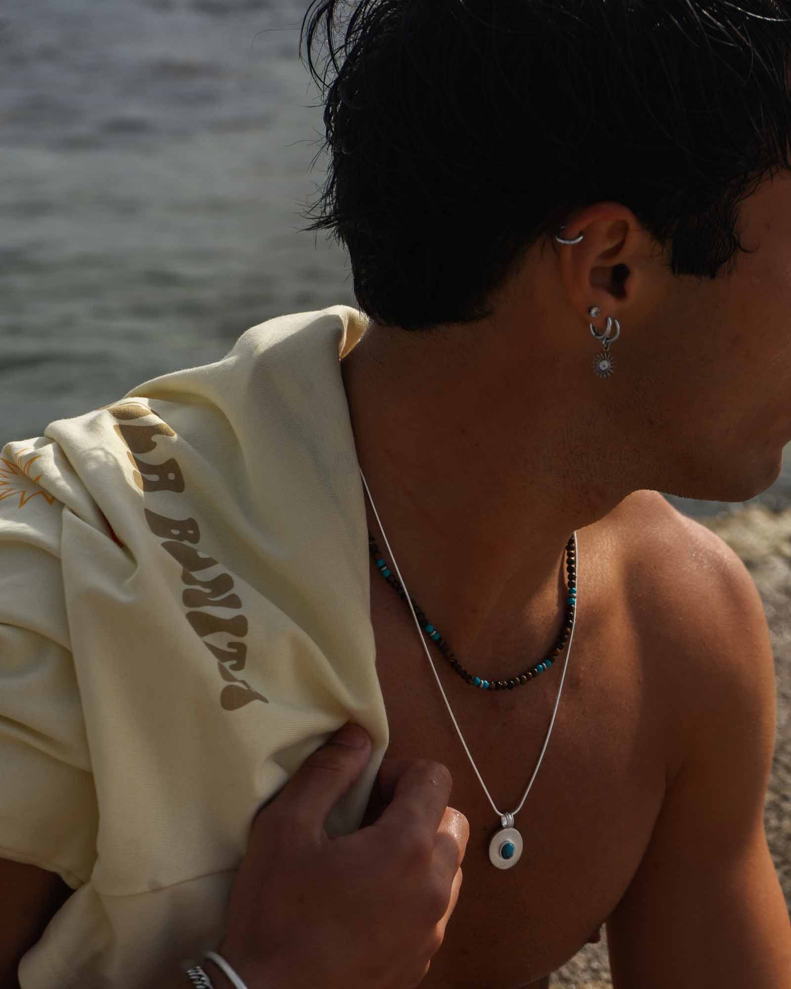 Silver Turqoise Neclace on the models neck - Unissex Jewelry Online - Dicci
