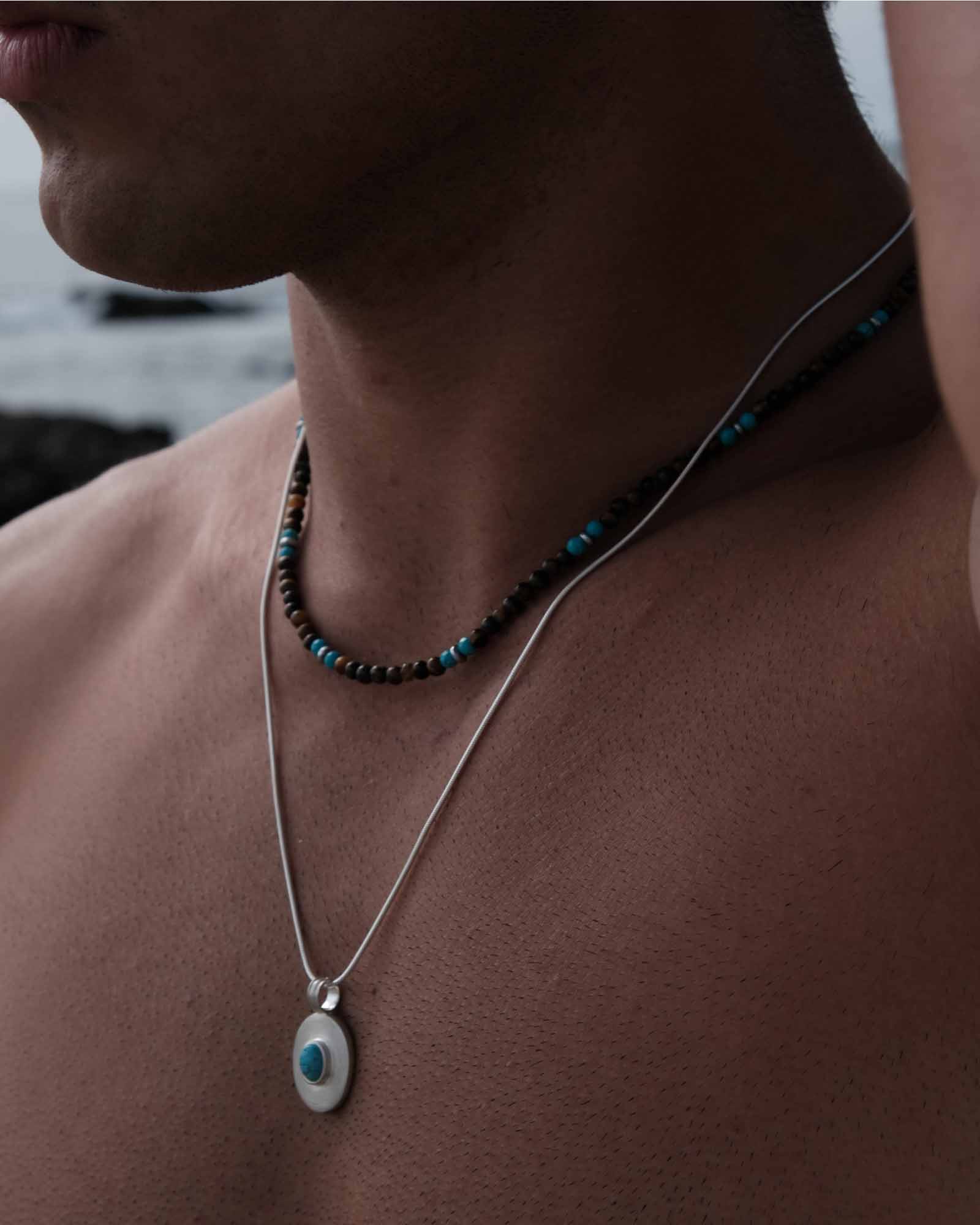 Silver Turqoise Neclace on the models neck - Unissex Jewelry Online - Dicci