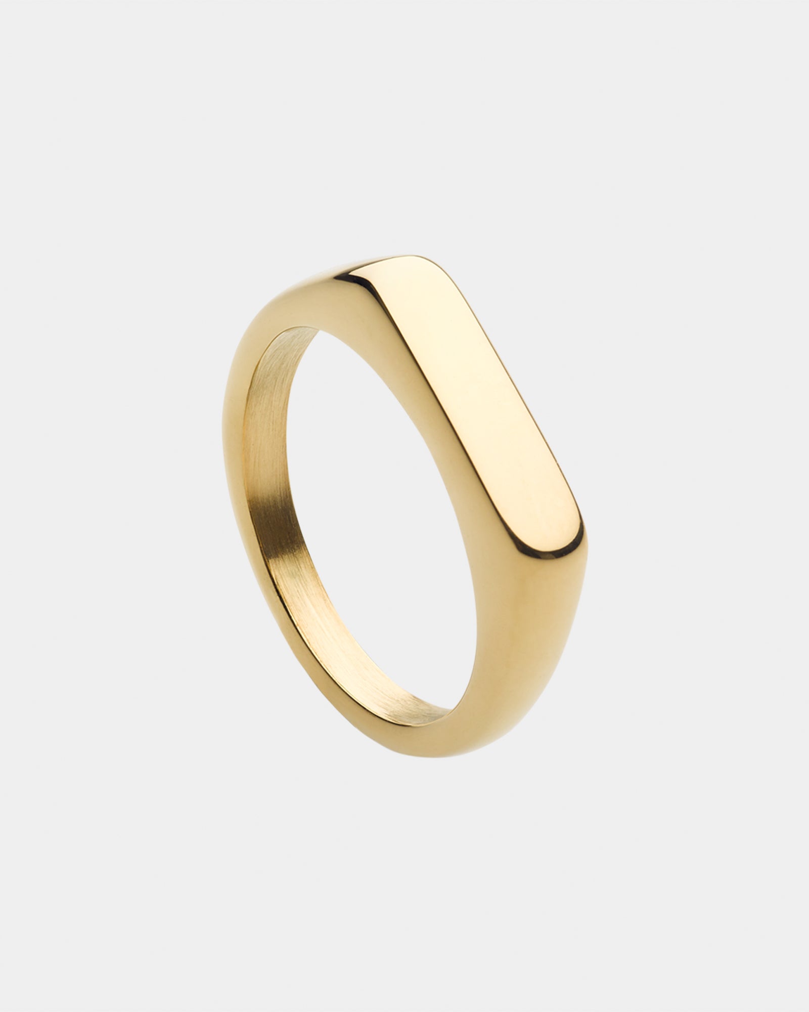 Flat Top Ring in golden stainless steel on a white background