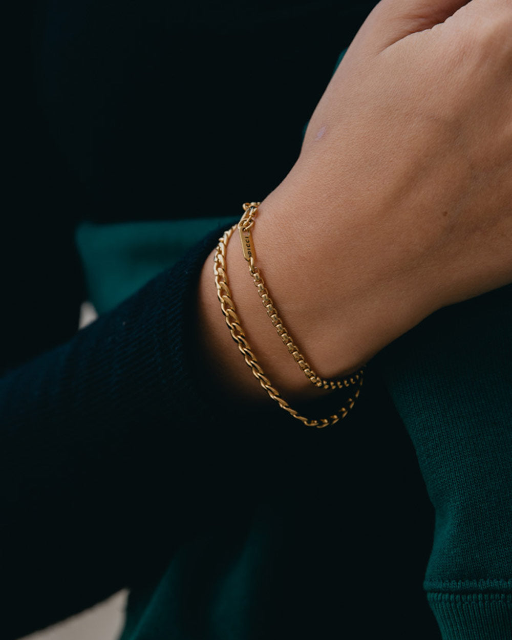 Golden stainless steel bracelet on wrist