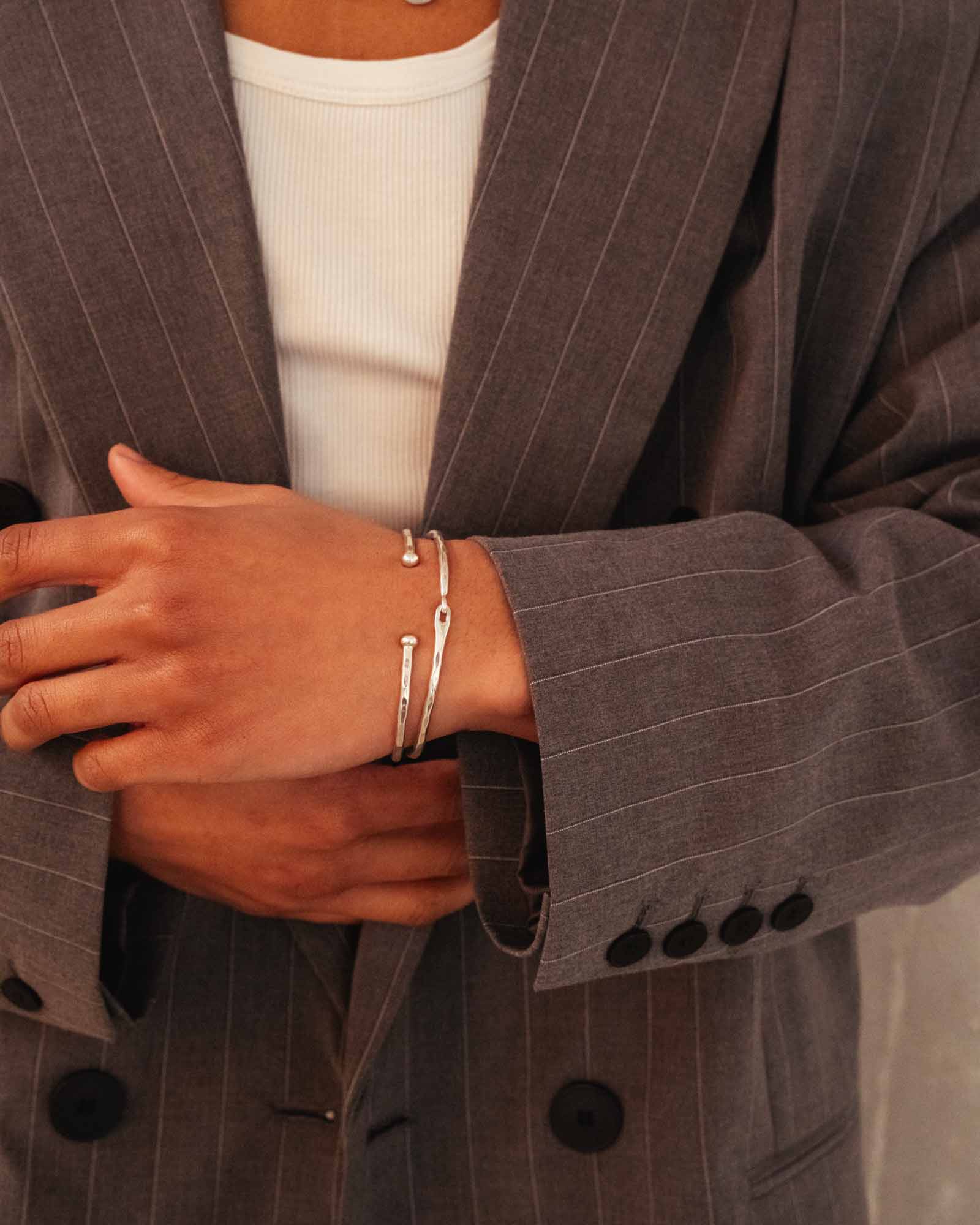 men wearing cuff bracelet polaris and hook bracelet
