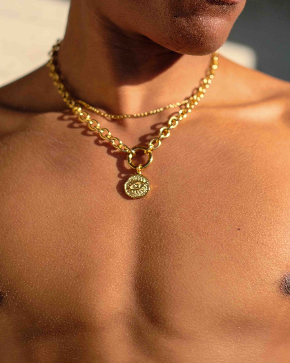 Eye of Providence - Golden Stainless Steel Chain Necklace on the models neck - Online Unisex Necklaces - Dicci