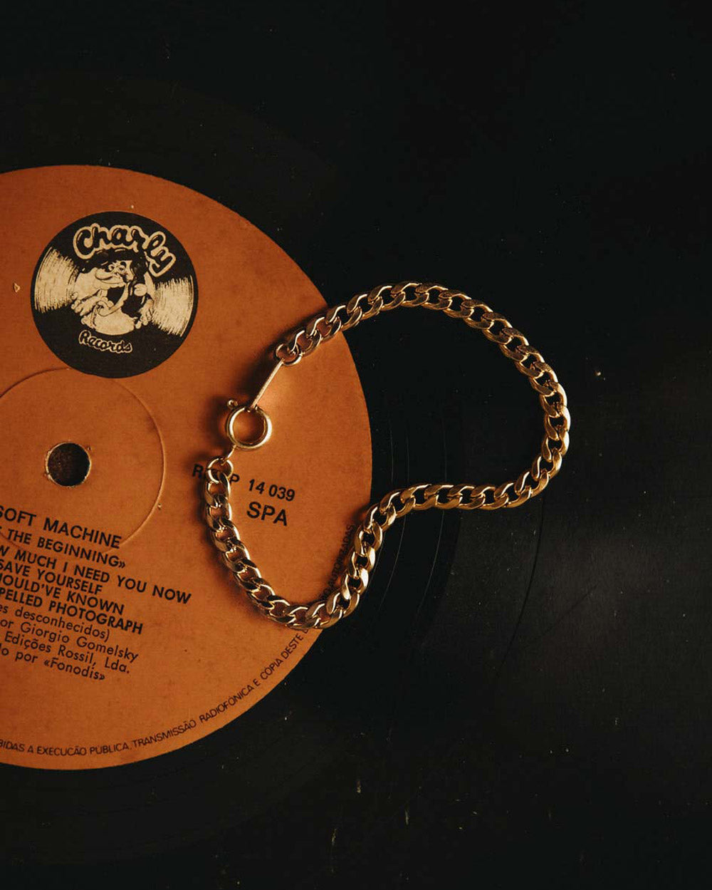 Golden flat cuban chain bracelet close-up