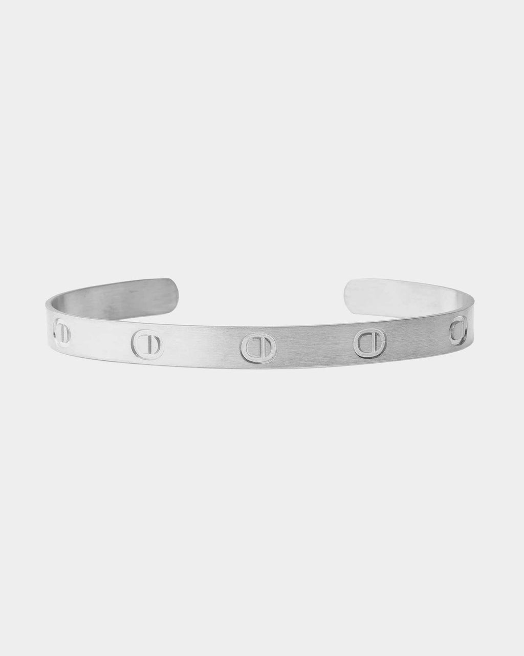 Silver ring with diamond accents on a white background
