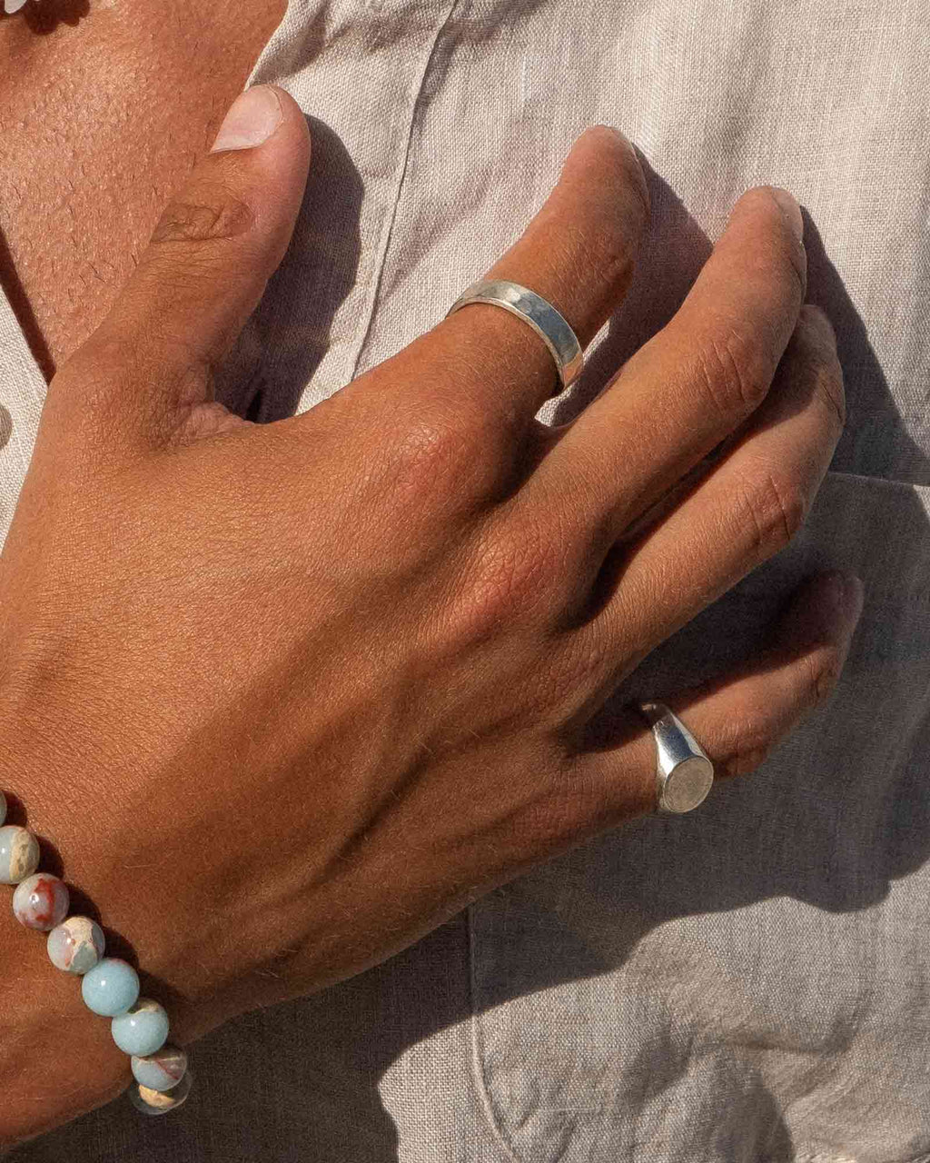 Signet ring silver on a neutral background
