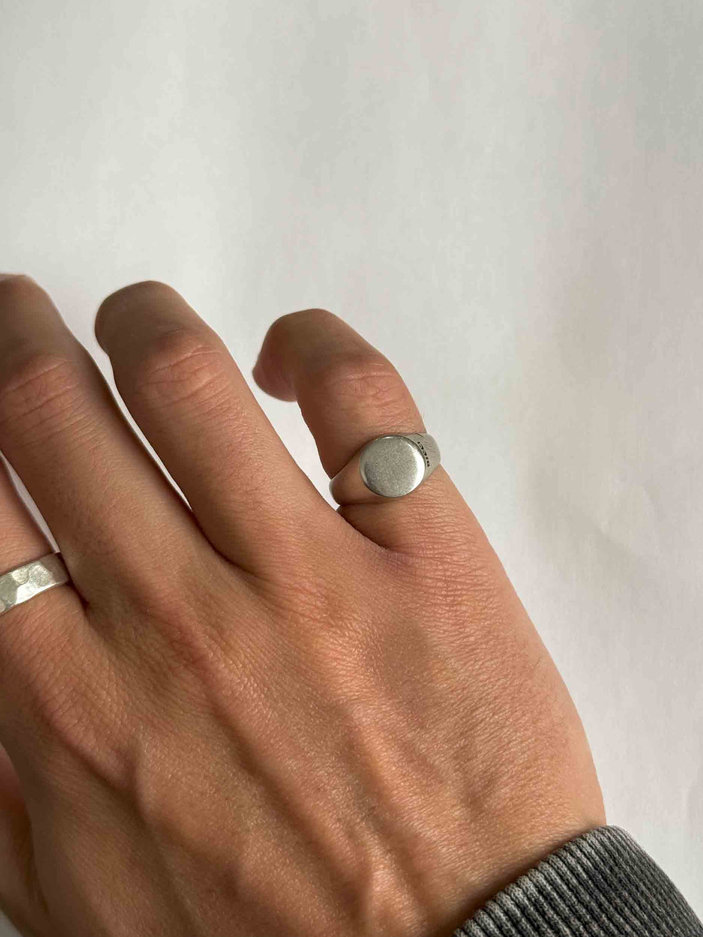Silver Signet Ring in stainless steel on a white background