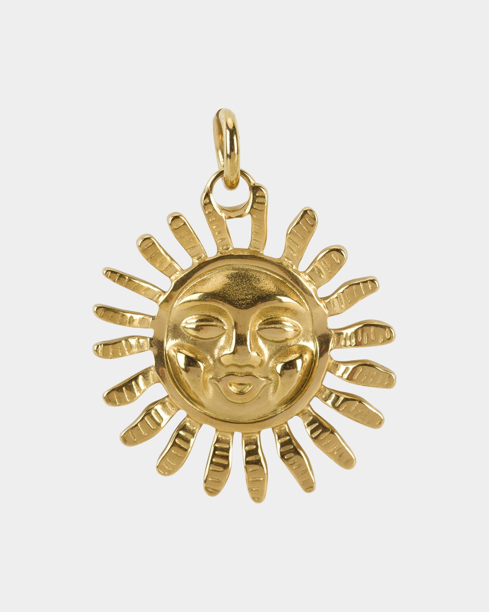 Sunflare golden pendant in stainless steel on a white background