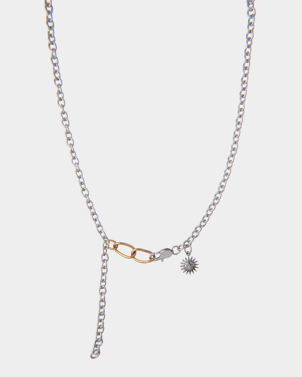 Necklace with a star-shaped pendant on a light gray background