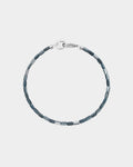 blue shell bracelets on silver background