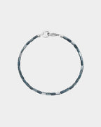 blue shell bracelets on silver background