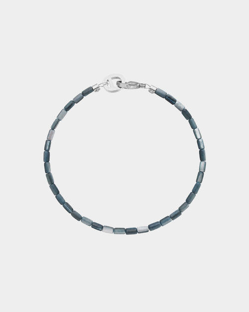 blue shell bracelets on silver background
