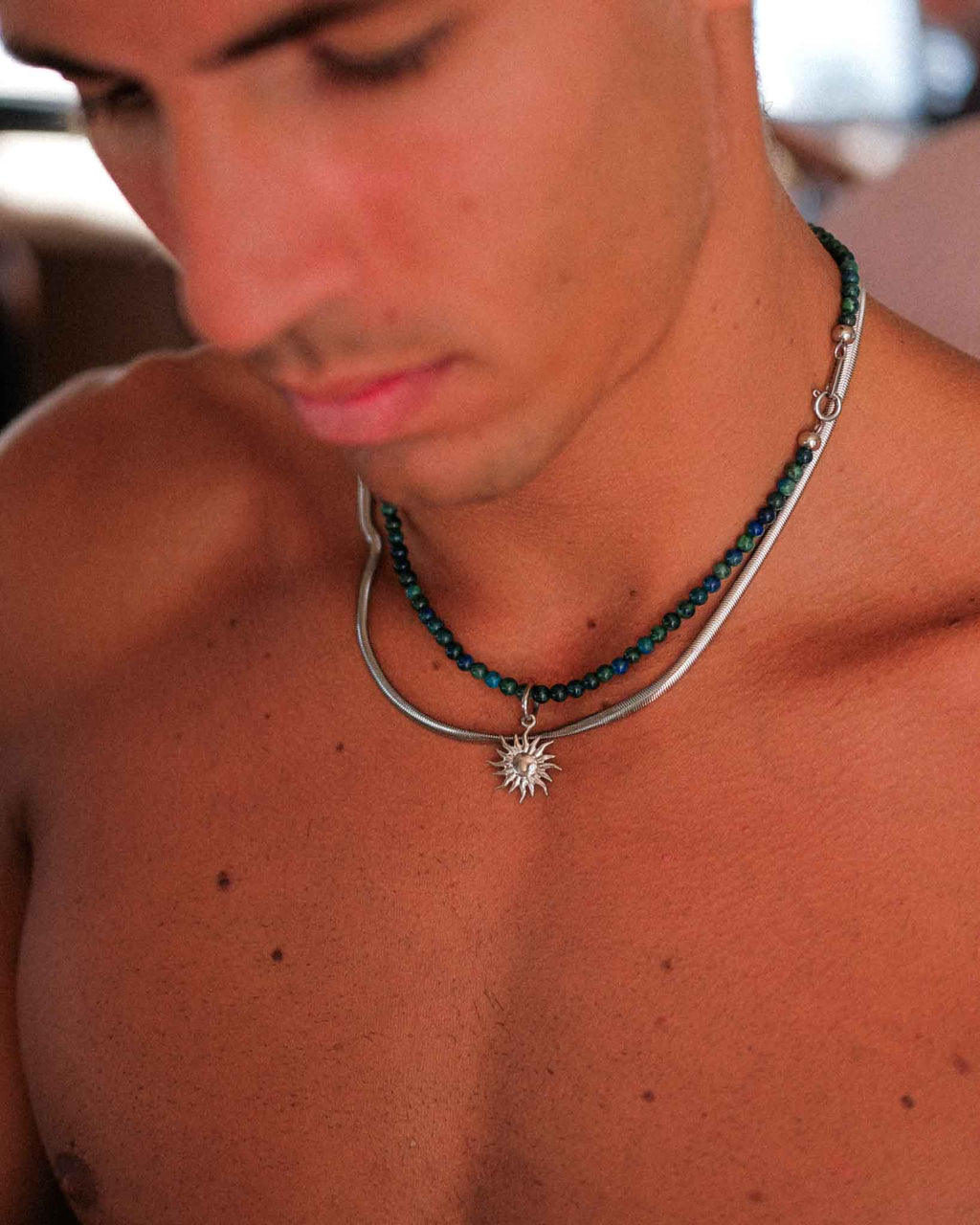 colar de pedras com sol em aço -radiant sun