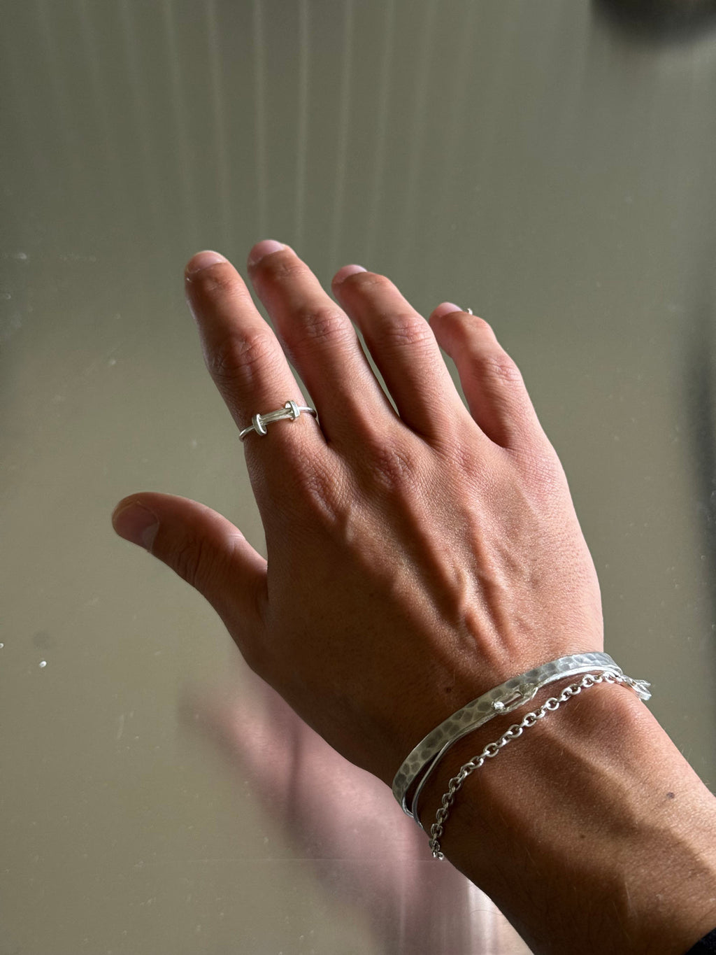 men wearing crossover ring