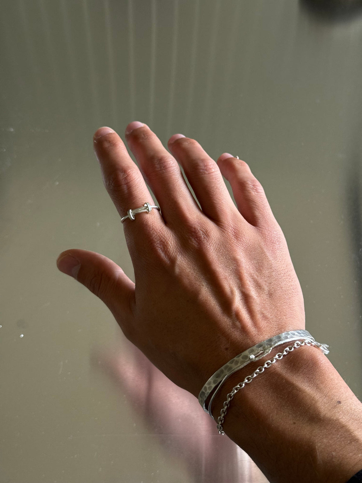 men wearing crossover ring