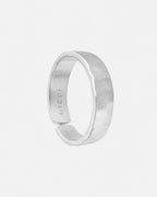 Hammered ring 5mm in stainless steel on a white background