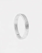 Hammered ring 3.5mm in stainless steel on a white background