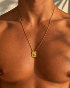 men wearing golden flaming hear scapular
