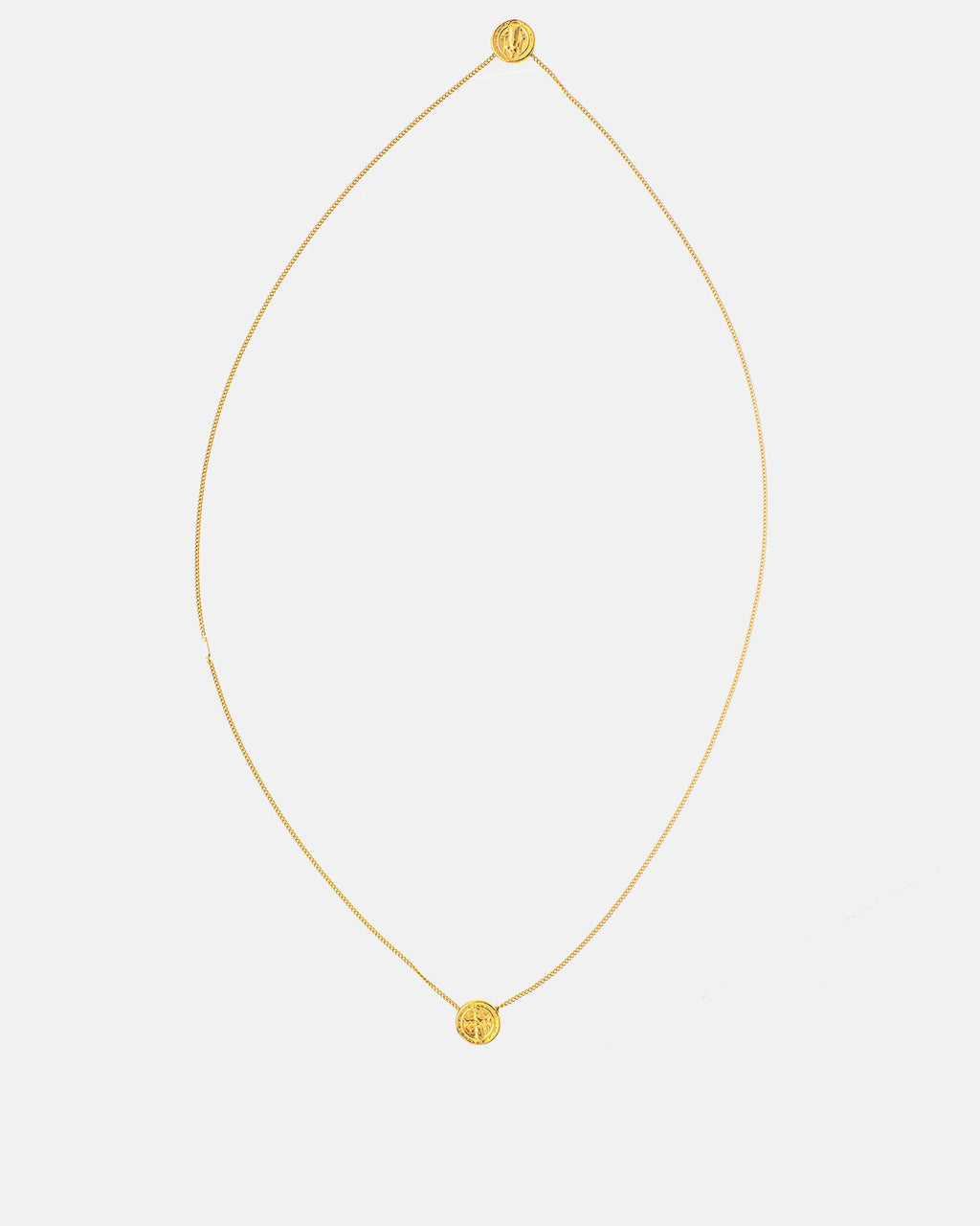 Gold-plated scapular round detail