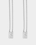 Silver - Two silver chain necklaces with rectangular pendants featuring an embossed figure, displayed against a light gray background.