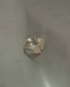 Soulmates ring in 925 silver detail on a neutral background