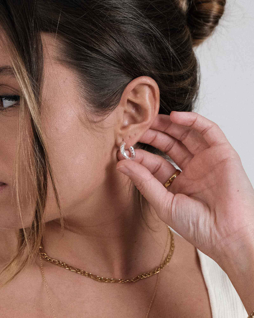 Hammered Silver 925 Earring on model paired with other Dicci accessories 