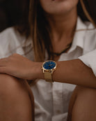 Chronometer watch - Blue dial with gold bracelet on the models wrist - Online Watches - Dicci