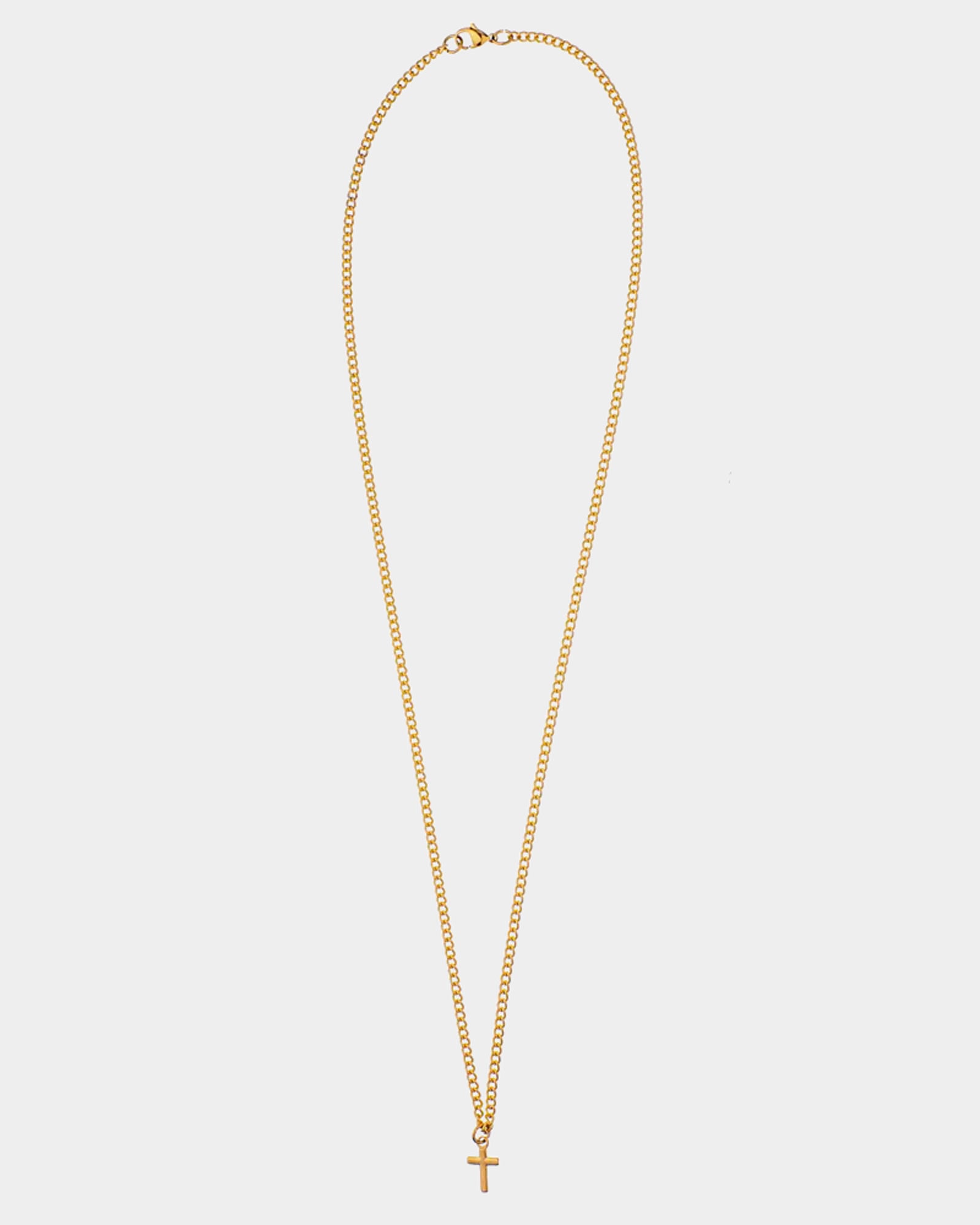 Caprera Golden Necklace with gold curb chain and small cross pendant inspired by Italian sea beaches