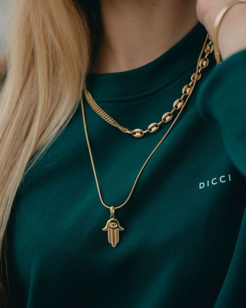 Hamsa minimalista de aço inoxidável dourado