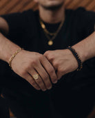 Lava Stone Bracelet 4mm Golden Clasp on the models wrist - Natural Stones Bracelets - Online Unissex Jewelry - Dicci