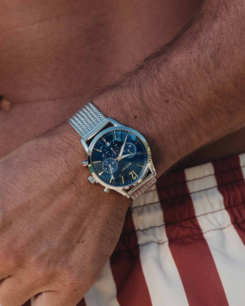 Chronometer watch - Blue dial with silver bracelet on the models wrist - Online Watches - Dicci