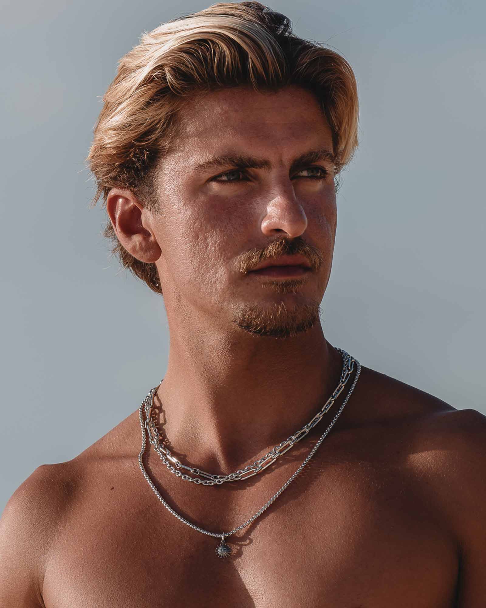 Sun Necklace - Stainless Steel Necklace with 'Sun' Pendant on the models neck - Online Unissex Jewelry - Dicci