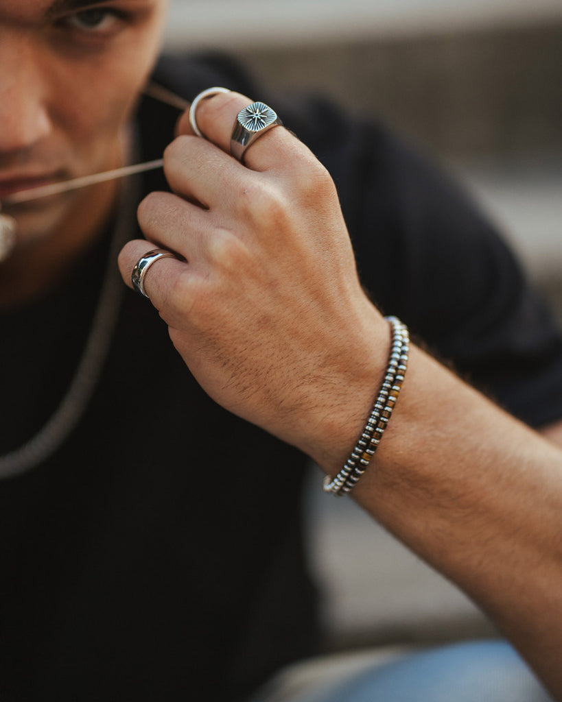 Natural Beads Bracelet 'Bali' on the wrist of the model - Hematite Bracelets - Online Jewelry - Dicci