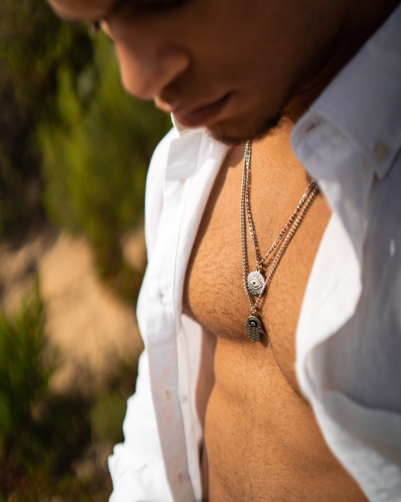 Hamsa - Stainless Steel Necklace on the models neck - Hand of Fatima - Online Unissex Jewelry - Dicci