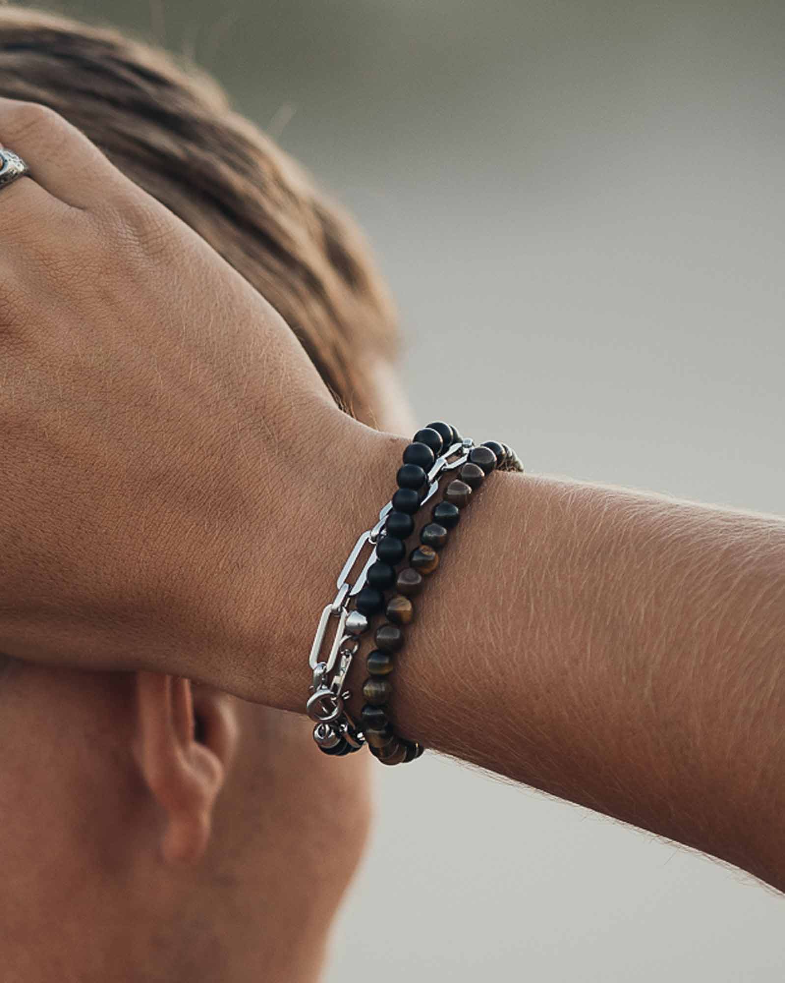 Silver Tiger Eye Bracelet 6mm on a model's wrist - Natural Stone Bracelet - Dicci