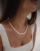 White Pearl Necklace on the model's neck - Online Unisex Jewelry - Dicci